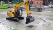 Jcb Excavator Clearing The Muddy Soil In The River - Jcb Video | RoadPlan