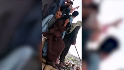 Militants ride armoured car through Kandahar as Taliban take Afghanistan's second biggest city