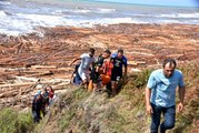 Sinop'ta tomruklarla birlikte sahile vuran ceset 9 saatte çıkarıldı