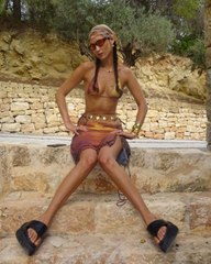 Bella Hadid Wore Throwback Platforms With a Tiny Bikini