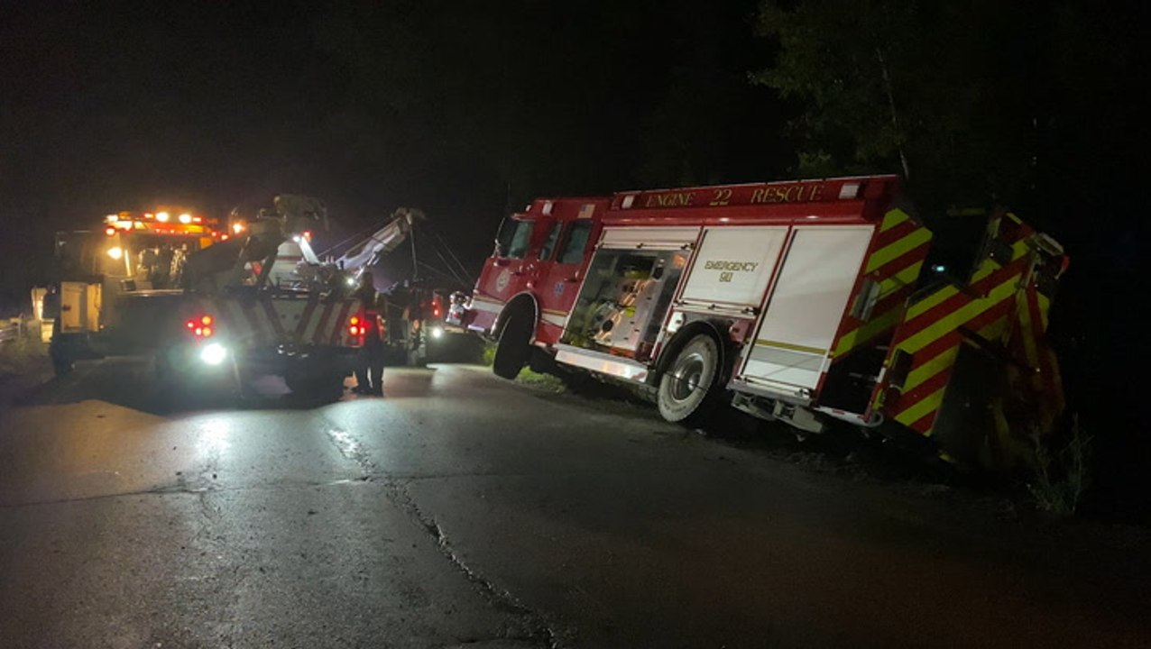 Firefighters okay after road collapses under firetruck