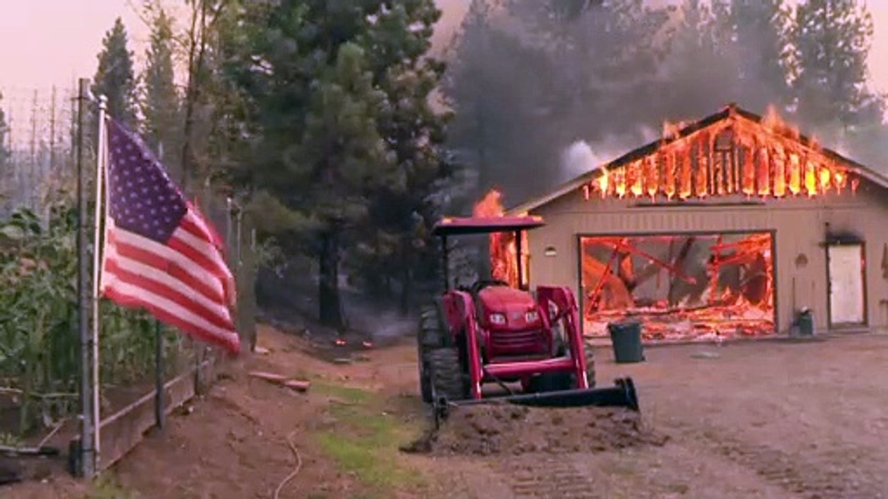Dozens of California fires threaten thousands of homes and whole towns