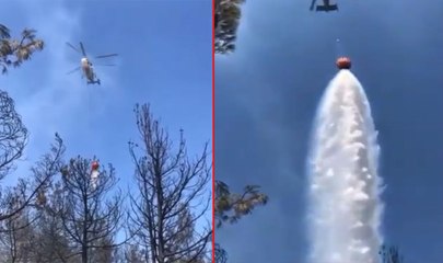 Canlı yayın yaparken helikopterin boşalttığı suyun altın kaldı