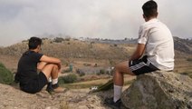 Onlookers watch as wildfire rages in central Spain