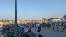 Watch: US troops fire in the air as crowds mob Kabul airport tarmac