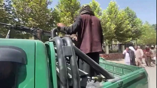 Taliban fighters patrol Kabul after taking the Afghan capital
