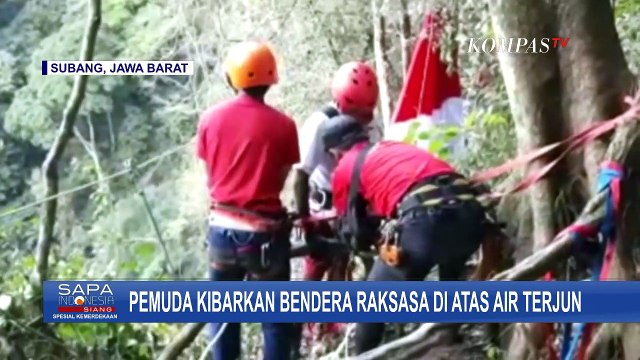 Komunitas Pecinta Alam Kibarkan Bendera Raksasa di Atas Air Terjun Setinggi 165 Meter