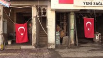 Son dakika: KASTAMONU - Bozkurt'ta selin vurduğu dükkanlara Türk bayrakları asılıyor