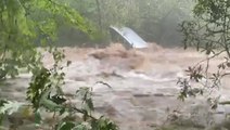Flash flooding overtakes buildings and cars in western North Carolina
