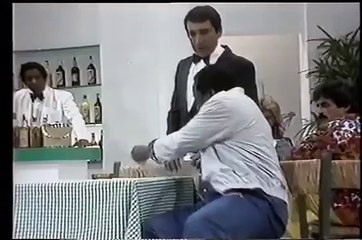 Mussum e os pés da mesa