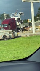 Crossing Semi Clipped by Oncoming Train