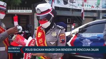 Polisi Bagikan Masker dan Bendera Merah Putih ke Pengguna Jalan