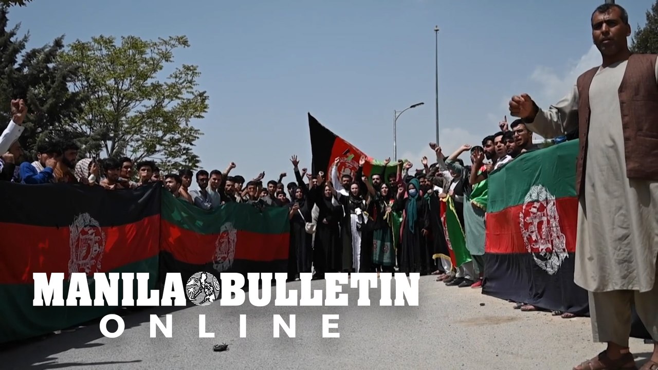 Defiant Afghans wave national flag on independence day after Taliban takeover