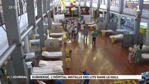 Submergé, l'hôpital installe des lits dans le hall