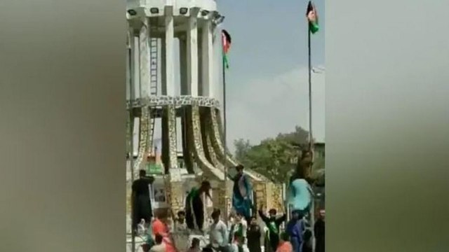 Nonstop: Afghans waving the national flag in Kabul