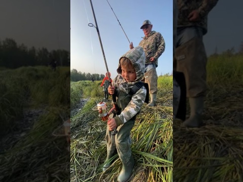 Tiny Fisherman Reels in Huge Fish