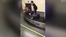 Japanese airport worker is filmed cleaning and buffing luggage before passengers pick it up Daily Mail Online (1)