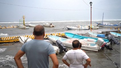 Fishers prepare for the second landfall of Hurricane Grace in Mexico