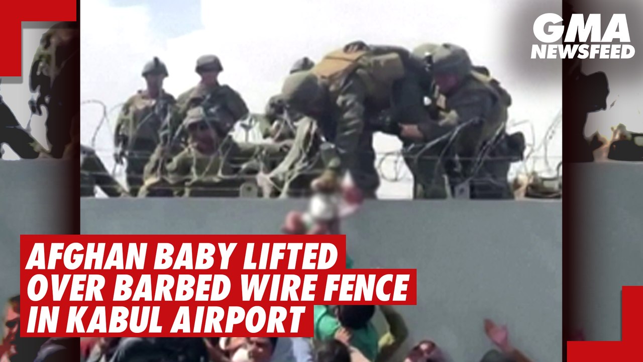 Afghan baby lifted over barbed wire fence in Kabul Airport | GMA News feed