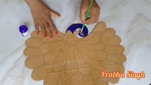 Beautiful peacock wall decoration ideas. Diy Wall hanging. Best craft idea out of waste cardboard and chips packet.