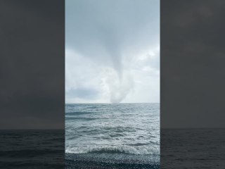 Beautiful Tornado Comes From the Ocean and Crashes into Shoreline