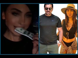 شاهدوا كيف احتفلت نيكول سعفان بعيدها بأكل الدولارات ! وقبلة حميمة مع فتاة