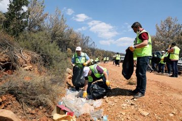 Menteşe'de orman yangınlarından etkilenen mahallede çevre temizliği yapıldı