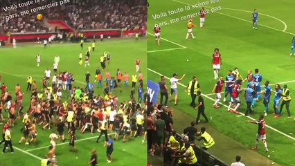 'Wild Fans Take Over the Field During Nice-Marseille Football Match'