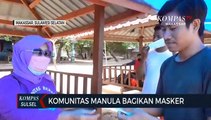 Komunitas Manula Bagikan Masker Dilokasi Wisata Makassar