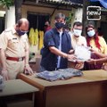 Actor Vivek Oberoi Distributes Raincoats To Mumbai Police Officials.