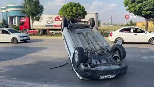 Ters dönen otomobilden burnu bile kanamadan kurtuldu