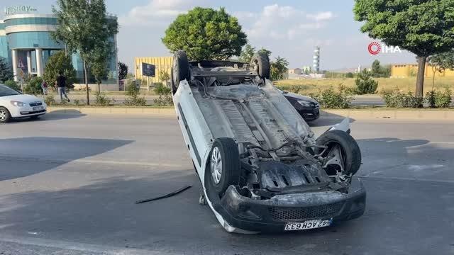 Ters dönen otomobilden burnu bile kanamadan kurtuldu