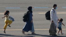 Image of the day: Afghan girl skips and hops after landing in Belgium