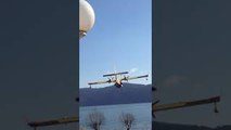 Firefighting Plane Lands in Italian Lake