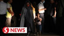 Plane carrying evacuated Afghans in transit to U.S. arrives in Albania
