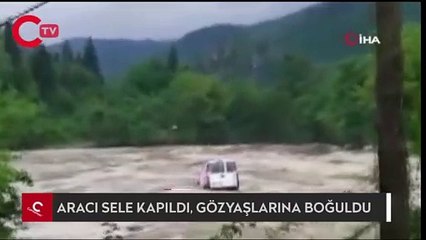 Aracının sele kapıldığını görünce gözyaşlarına boğuldu