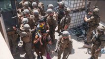 Video: Chaos and panic after firing at Kabul airport