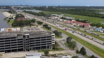 Travelers stuck at airport after hundreds of flights canceled