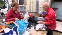 SBS 6 hart van nederland Vrijwilligers Rode Kruis sorteren gedoneerde kleding voor Afghaanse vluchtelingen in zeist