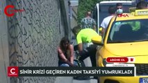 Taksim'de sinir krizi geçiren turist kadın, bindiği taksiyi yumruklayıp tekme attı