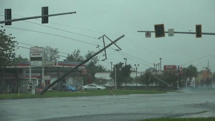 Ida's intense winds knock power poles to the street