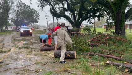 Crews get to work cleaning up damage as Ida's eye passes over