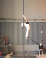 Guy Shows Impressive Balance Skills While Performing Various Acrobatic Tricks On a Chinese Pole