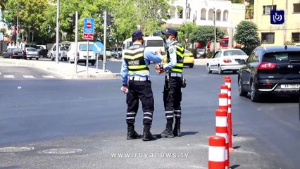 تحت الحر.. رقباء السير على مداخل الباص السريع لخدمة المواطنين