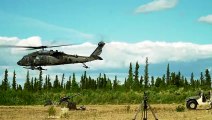 U.S. Army Blackhawks Deliver Artillery During Military Exercise