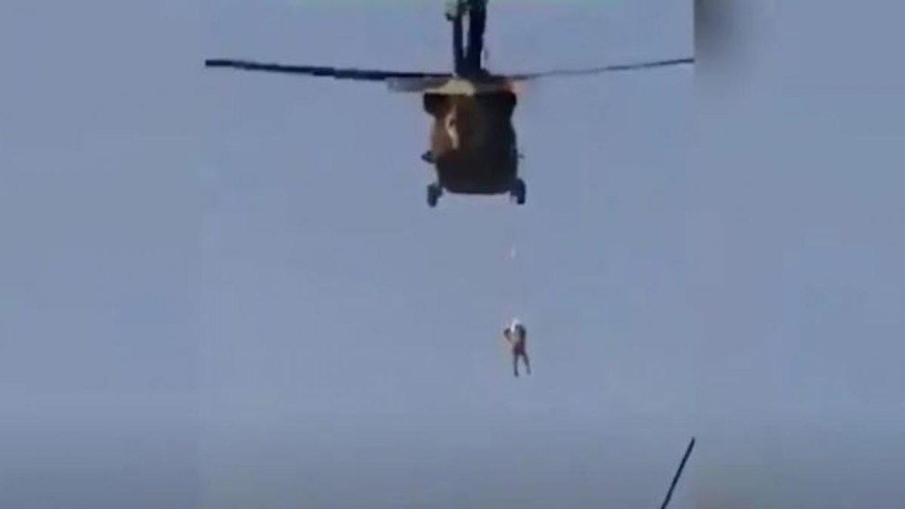 Debate: Taliban fly chopper with body hanging from rope