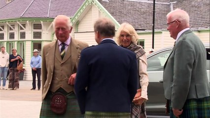 Charles and Camilla don full tartan during visit to Ballater
