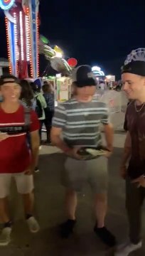 DJ Blitz taking pictures with fans at The Ex