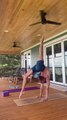 Man Displays Impressive Flexibility Skills While Performing Body Contortion Tricks On His Back Porch