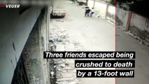 Watch the Moment Three Friends Escaped Being Crushed by a Wall That Collapsed